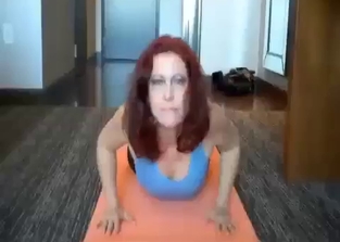 Redheaded mommy does yoga and fucks her son